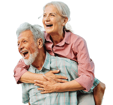 playful older couple laughing