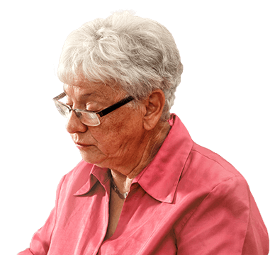 older woman looking somber