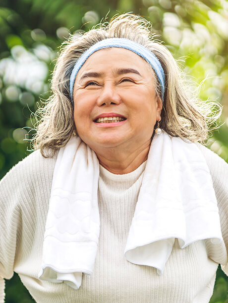 Woman wearing exercise gear outdoors