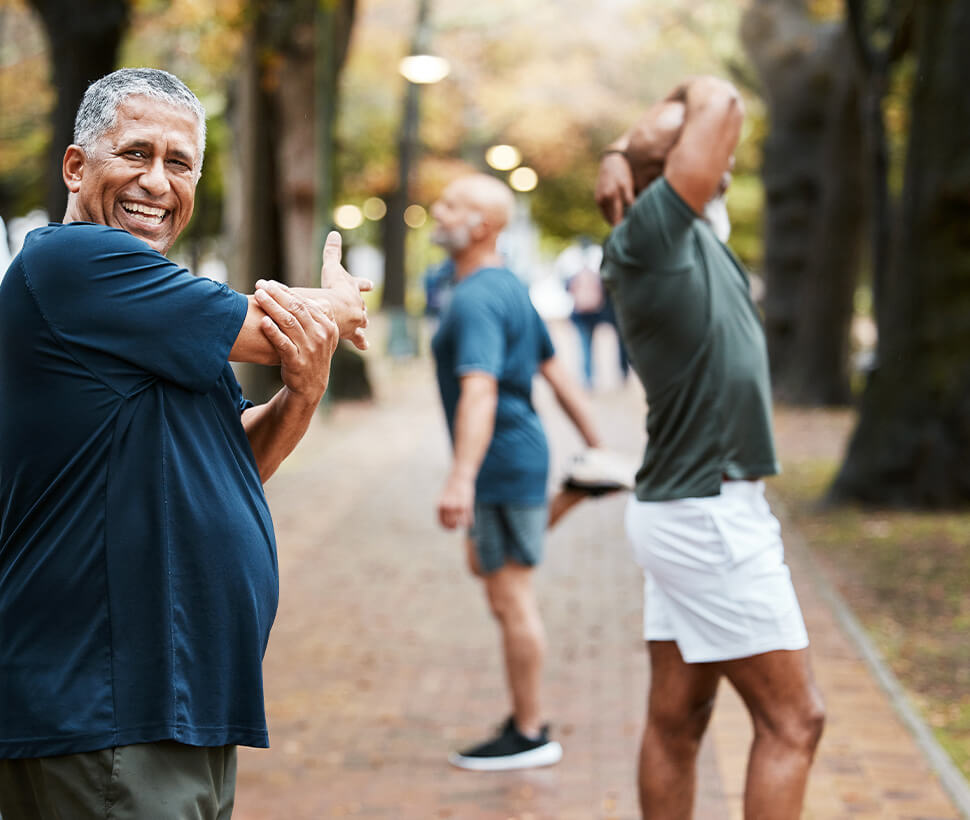 man stretches before run