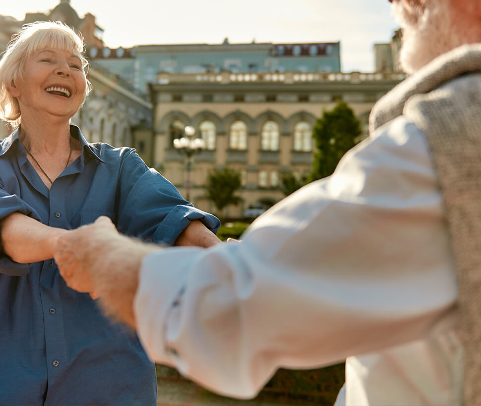 woman holding hands with spouse